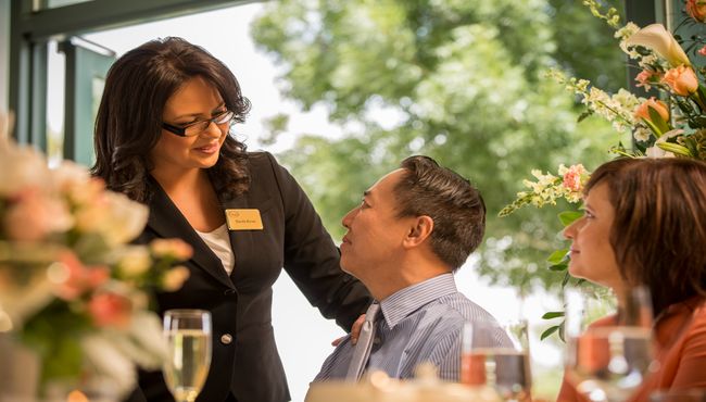 An associate provides professional and attentive service during a personalized Celebration of Life.