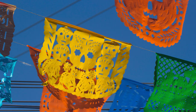 Colorful flag decorations for Dia de los Muertos
