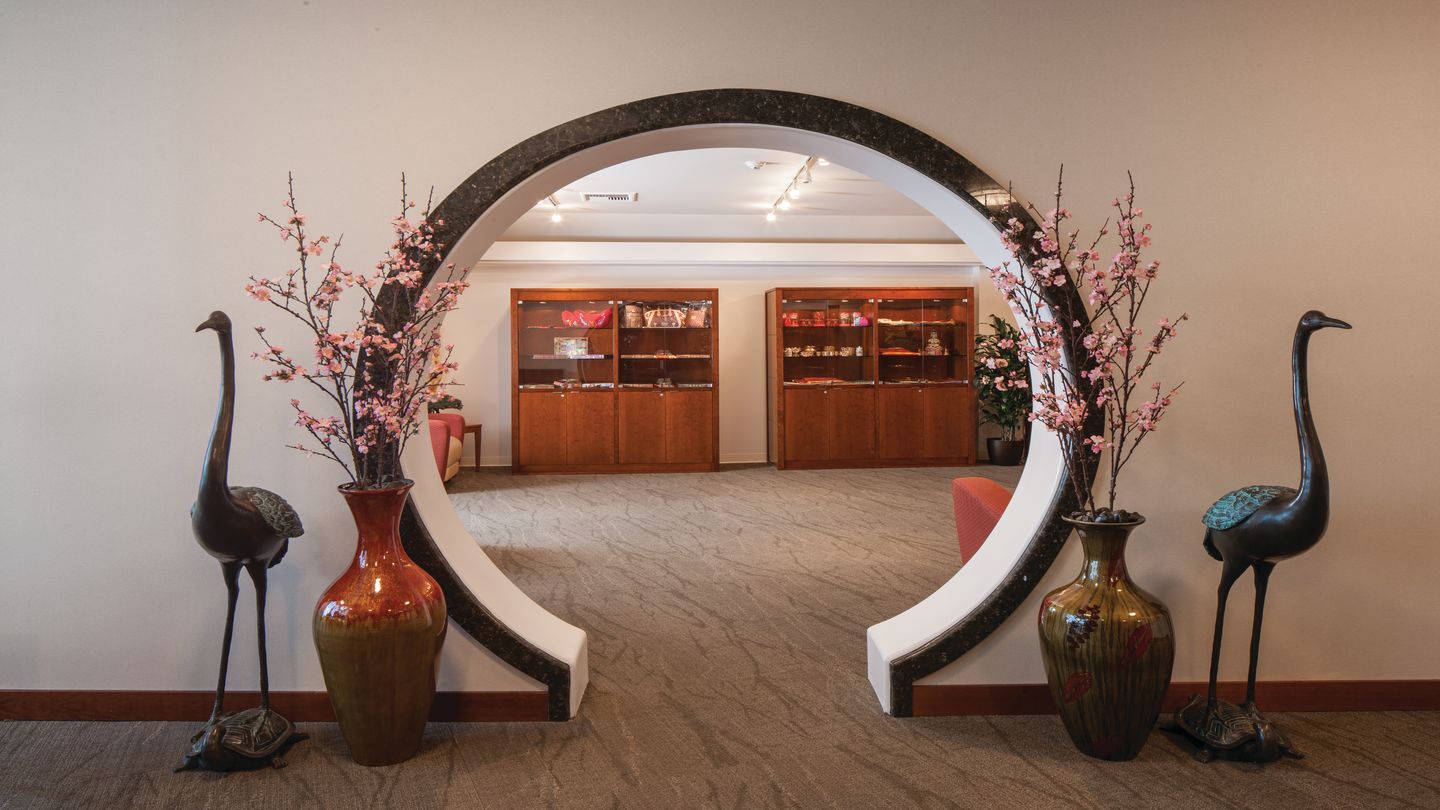 Culturally significant cranes flank a doorway in Rose Hills Mortuary's Hall of Endless Remembrance. 
