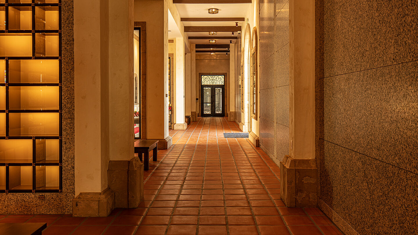 Glass-front niches and crypts inside Our Lady of Guadalupe Mausoleum 
